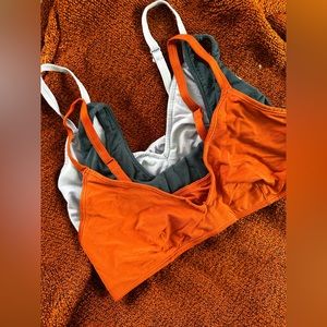 Set of 3 Parade Bralettes! 2 triangle, one scoopneck. Red one is NWT. Size M